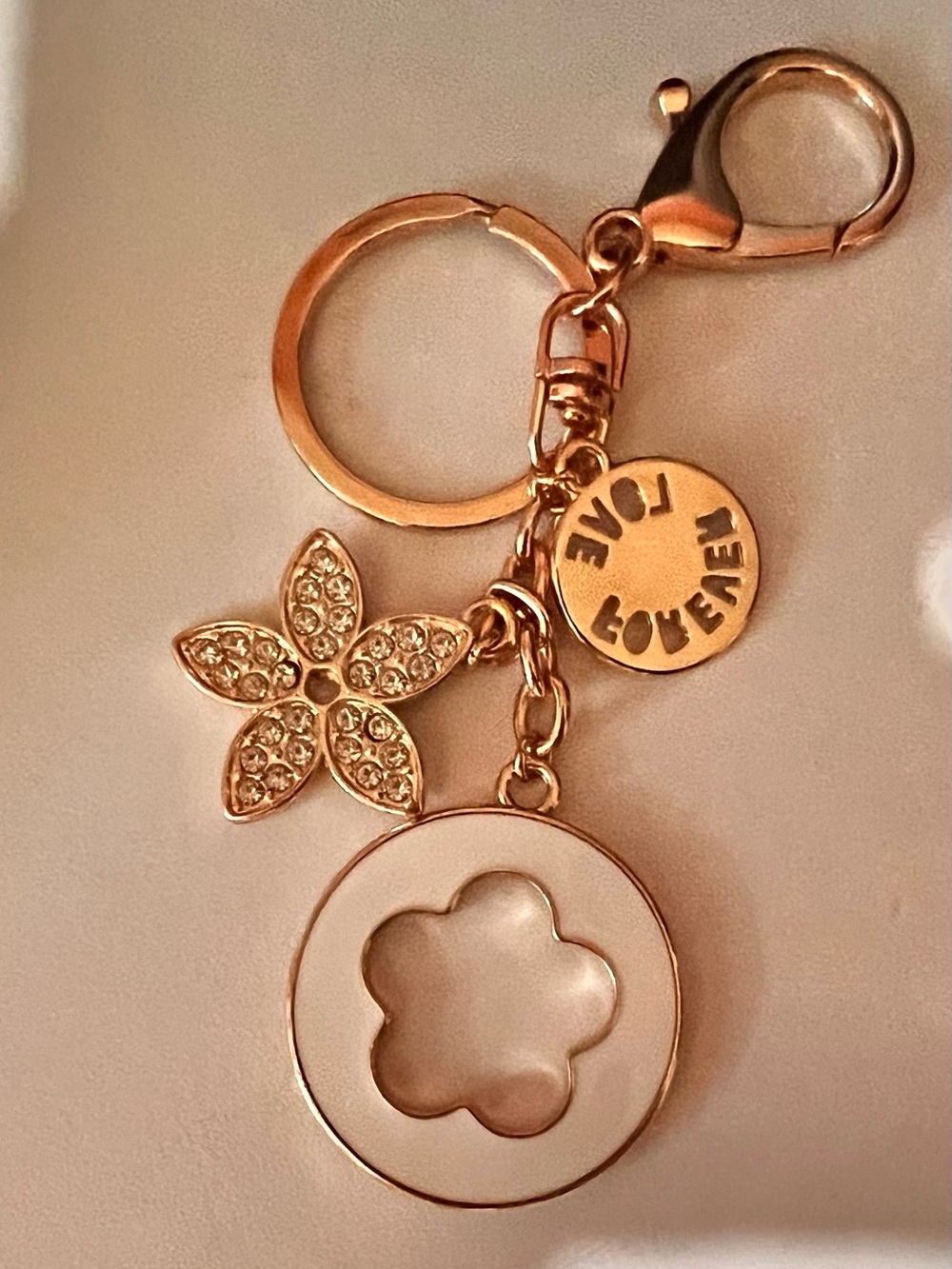 Gold Floral Charm Keychain with White Enamel Accent